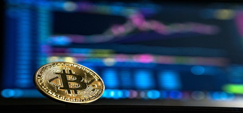 Cryptocurrency related imagery such as bitcoin.