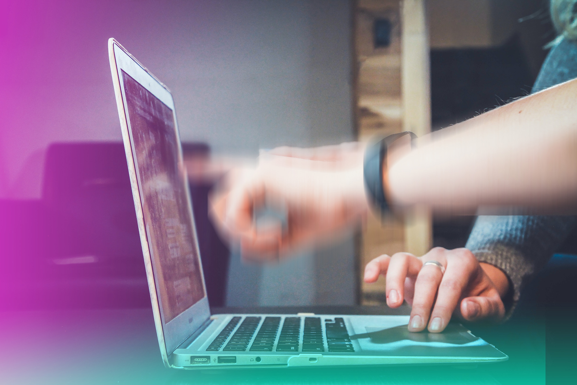 A person pointing at a laptop screen.