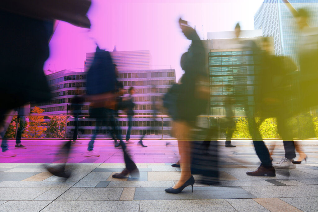 A busy street with people walking.