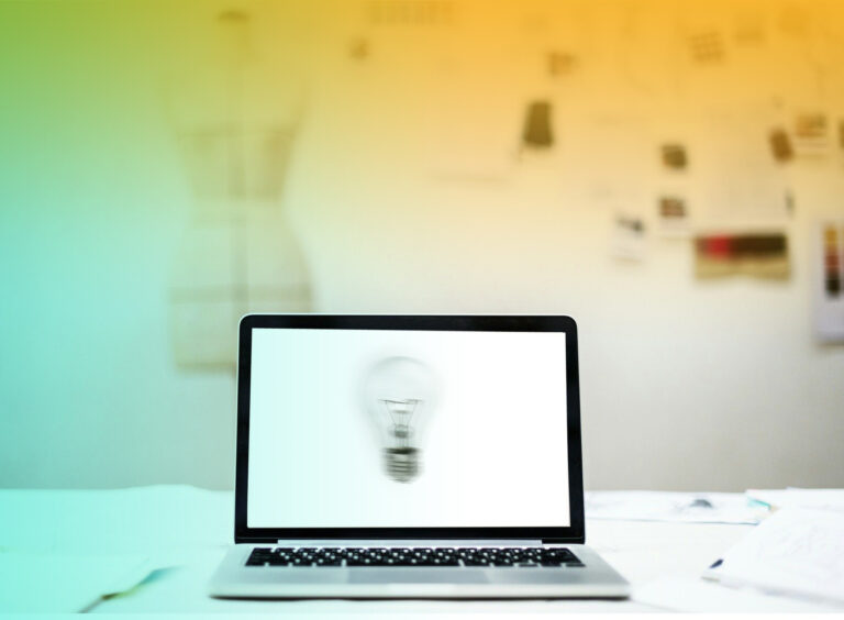 Laptop displaying a light bulb.