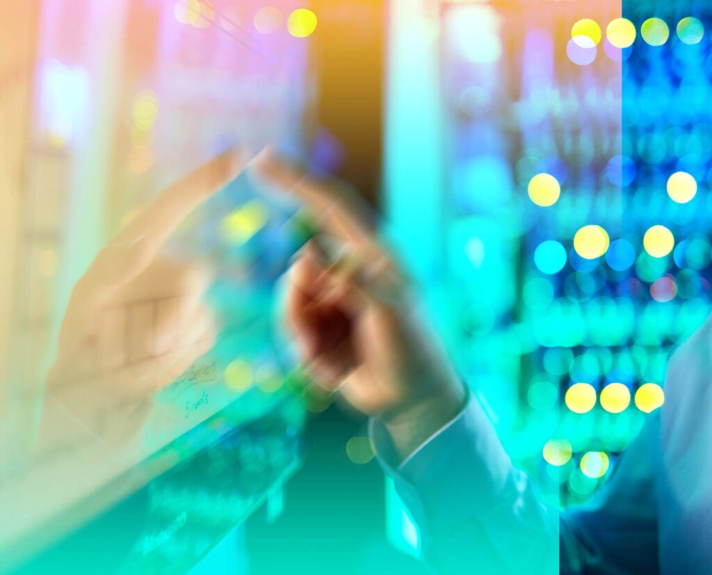 Image of hand pressing buttons on a screen