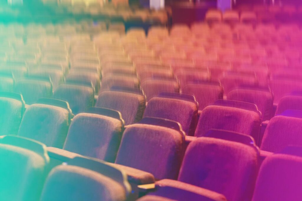 Rows of empty chairs in a conference theatre